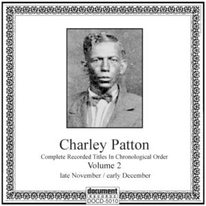 Charley Patton - Complete Recorded Titles in Chronological Order, Volume 2 CD cover. Black and white portrait of blues musician Charley Patton, with ornate border and title details