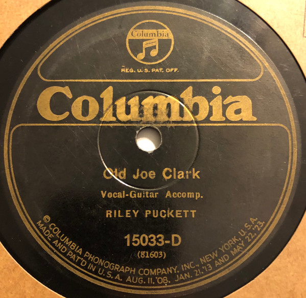 "Original 78 RPM Columbia record label featuring Riley Puckett's recording of 'Old Joe Clark,' catalog number 15033-D. This track is included in reissued and remastered form on the DOCD-8074 CD."