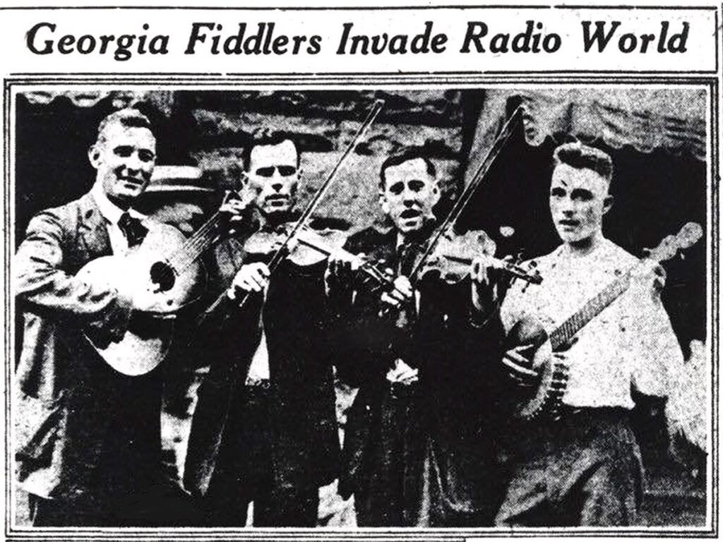 T.M. “Bully” Brewer, Earl Johnson, Fiddlin’ John Carson, and L.E. Akin pictured before their historic 1922 country music radio debut on WSB Atlanta.