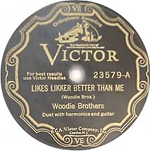 Vintage Victor record label for Likes Likker Better Than Me by the Woodie Brothers, duet with harmonica and guitar