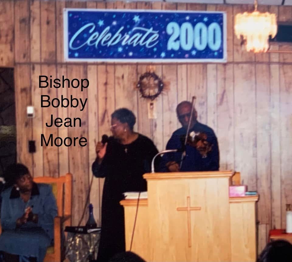Bishop Bobby Jean Moore and Howard Armstrong during a church visit in 2000