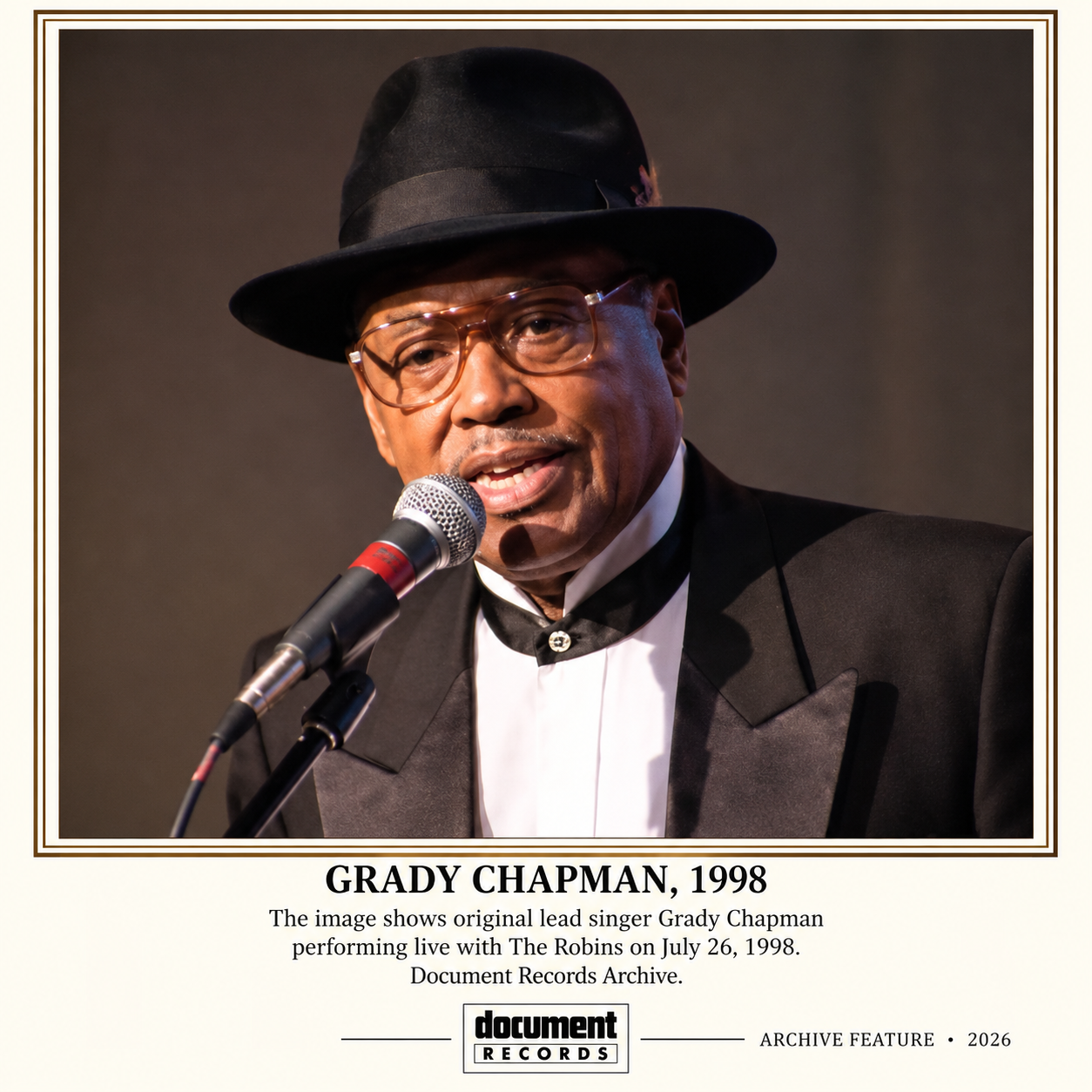 Grady Chapman singing on stage in 1998